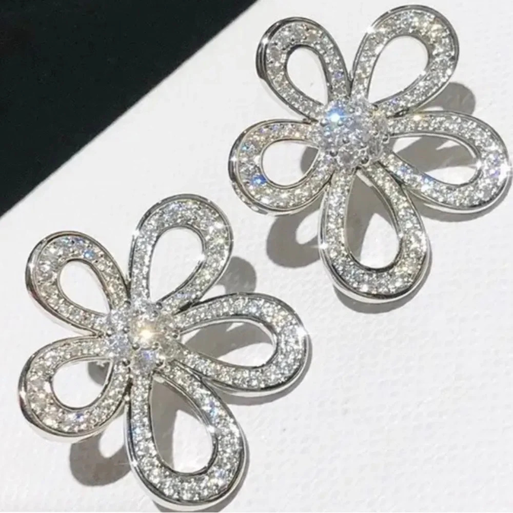 Floral silvertone rhinestone earrings - new in package. - Picture 1 of 5